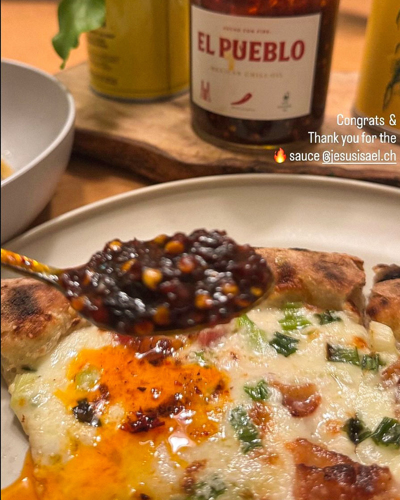 Customer photo of pizza topped with El Pueblo Mexican chili oil