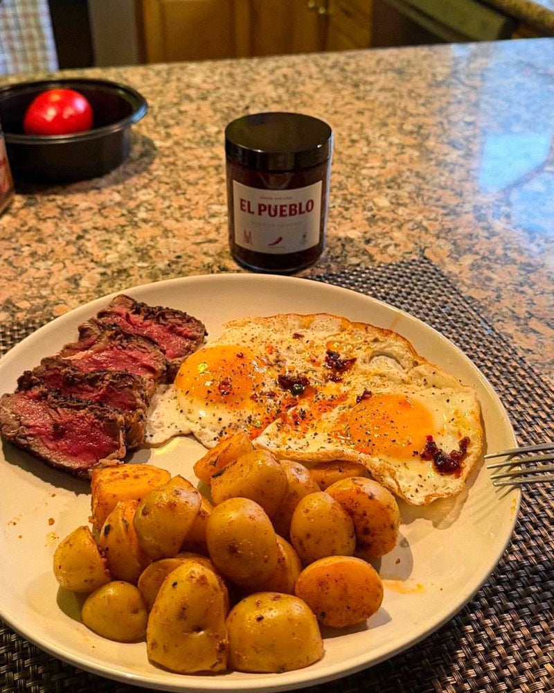 Customer photo of steak and eggs topped with El Pueblo Mexican chili oil
