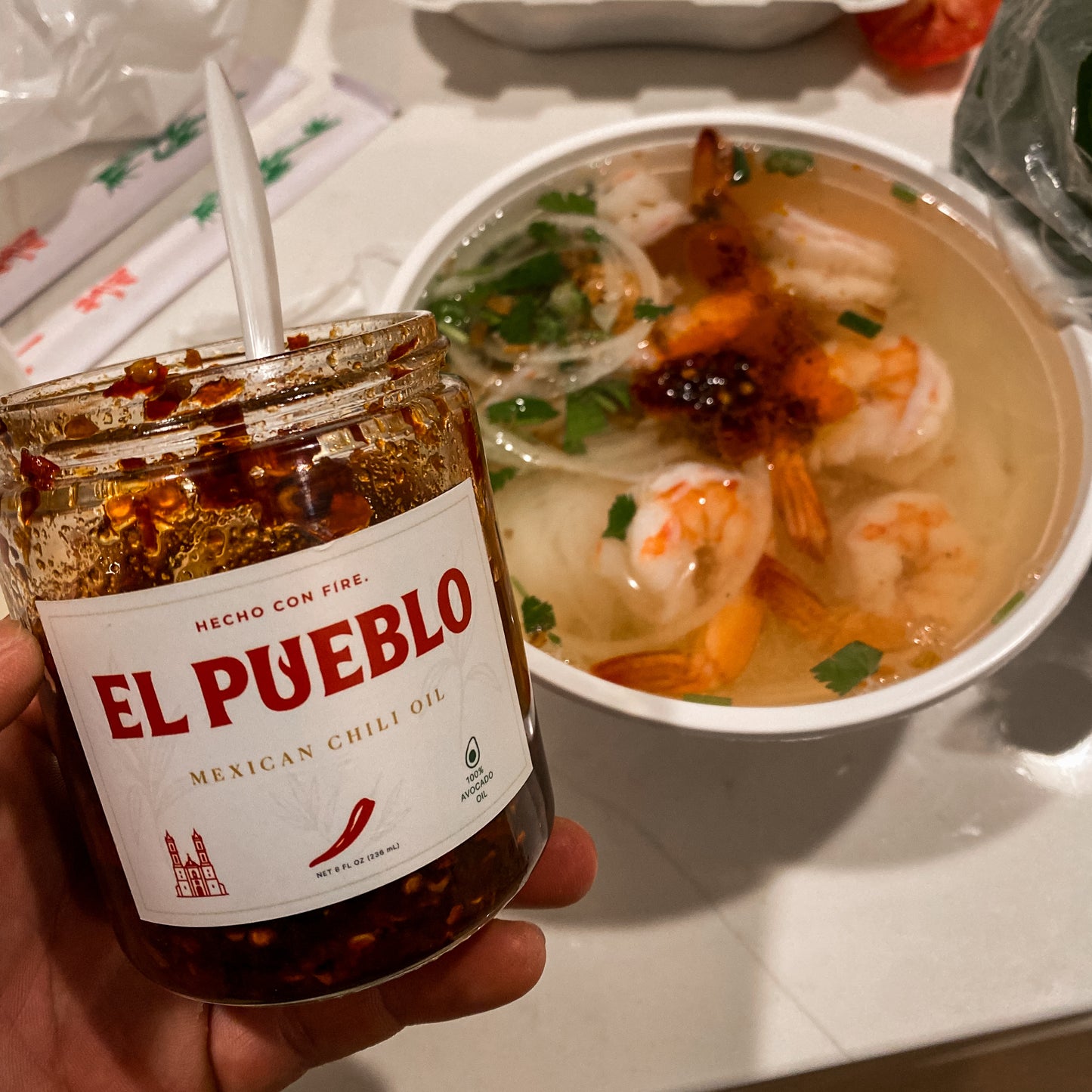 El Pueblo Mexican chili oil added to a shrimp soup and pho for bold heat and flavor