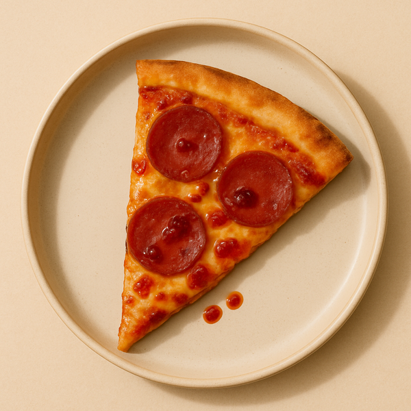 Slice of pizza with El Pueblo Mexican chili oil drizzled on top