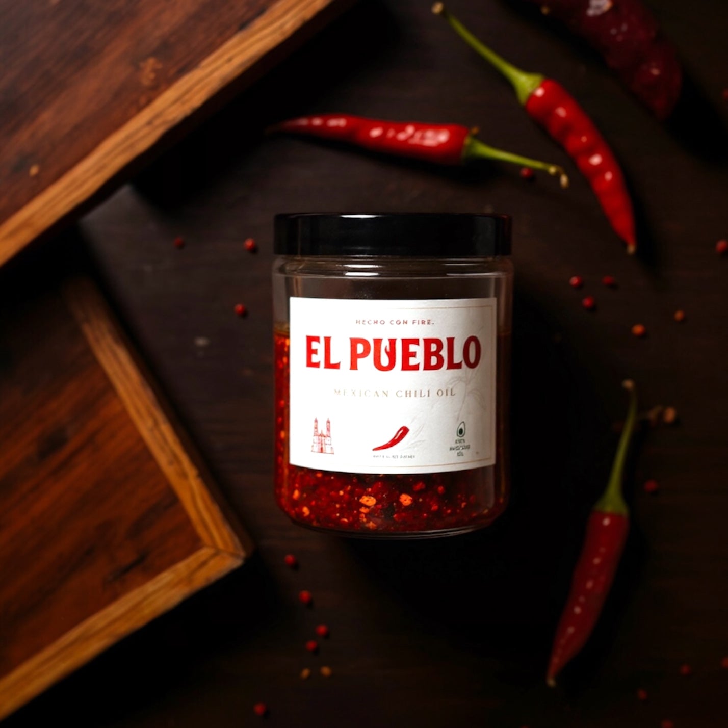 Jar of El Pueblo Mexican chili oil made with avocado oil and dried Mexican chiles