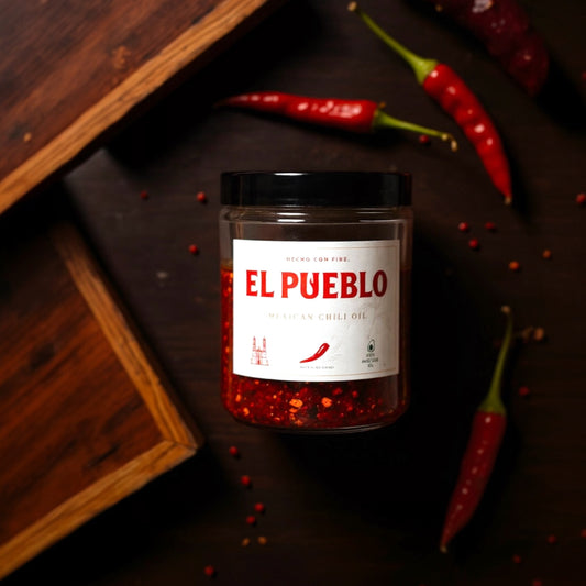 Jar of El Pueblo Mexican chili oil made with avocado oil and dried Mexican chiles